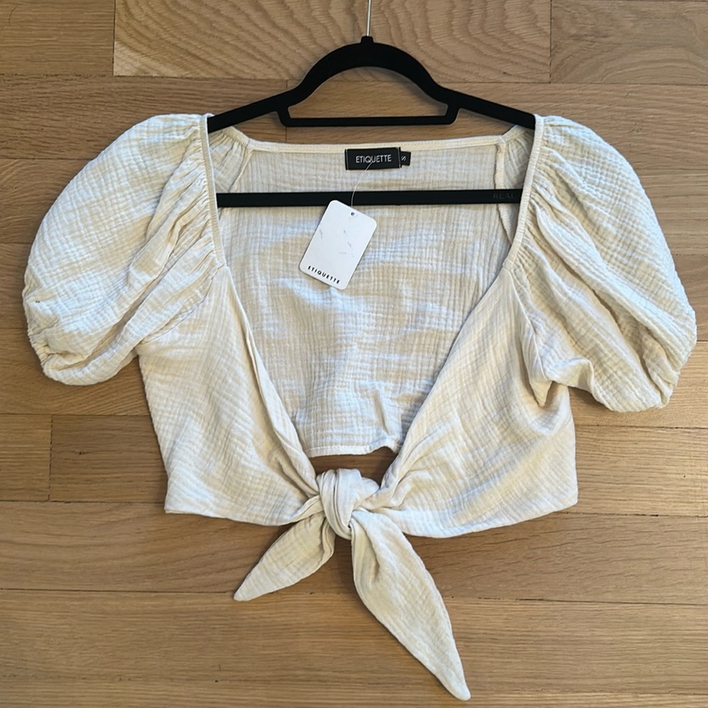 Cream front-tie Juliet sleeve crop